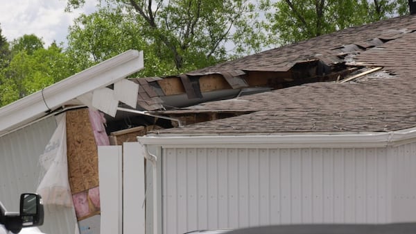 Erosion leaves grocery store hanging off steep embankment