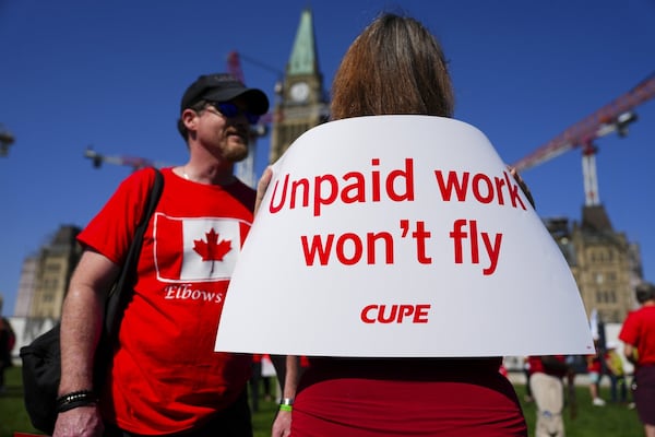 Flight attendants union urges government to reject airlines' claims on unpaid work